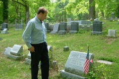 The composer at the grave of Samuel Barber in West Chester in 2005